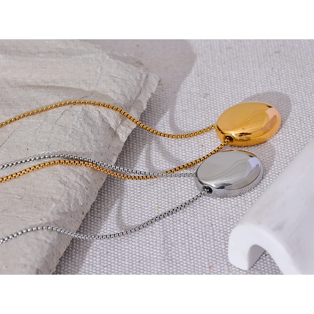 Golden Egg Pendant Necklace.