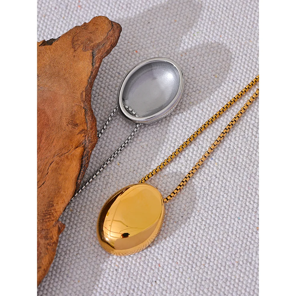 Golden Egg Pendant Necklace.